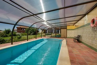 Piscina en o cerca de Apartamentos El Jardín del Poeta