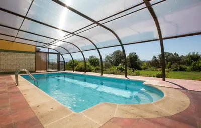 Piscina en o cerca de Apartamentos El Jardín del Poeta