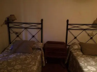 Cama o camas de una habitación en LA ANTIGUA TAHONA