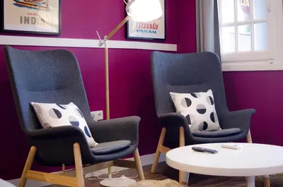 Zona de estar de Apartamentos Suites Roma