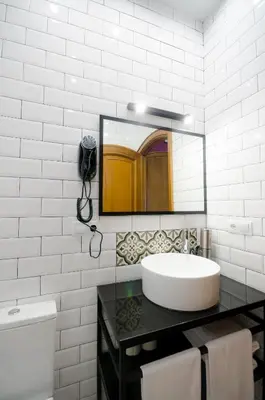 Un baño de Apartamentos Suites Roma