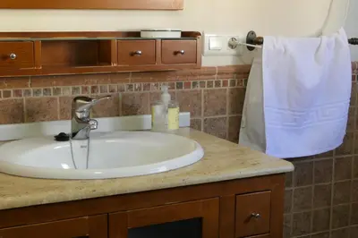 Un baño de Apartamentos Altozano