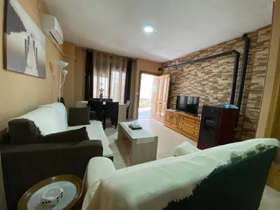 Una televisión o centro de entretenimiento en AT Rural NAVALINDA
