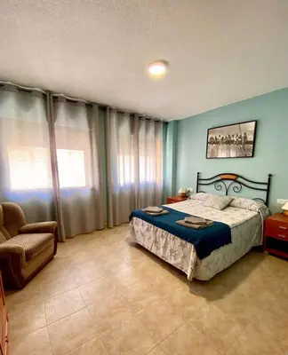 Cama o camas de una habitación en AT Rural NAVALINDA