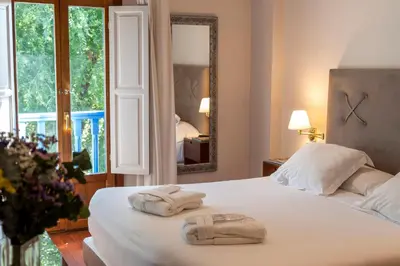 Cama o camas de una habitación en Hotel Rural Spa Don Juan de Austria