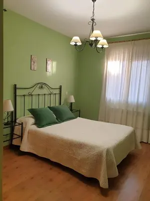 Cama o camas de una habitación en Los Guijos