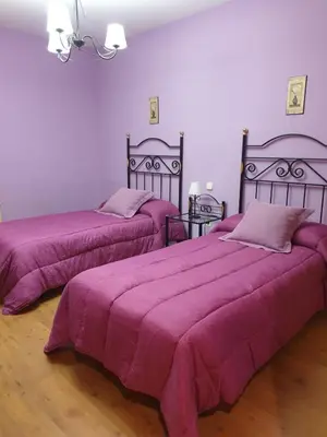 Cama o camas de una habitación en Los Guijos