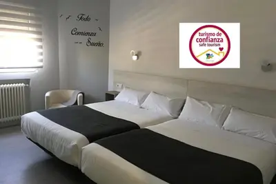 Cama o camas de una habitación en Hostal I Dream Salamanca