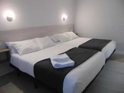 Cama o camas de una habitación en Hostal I Dream Salamanca