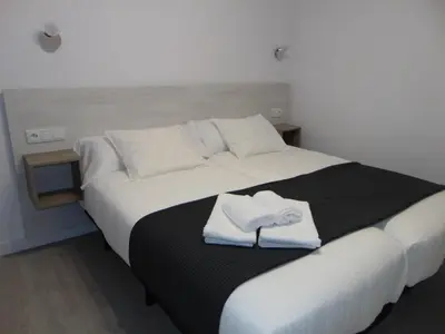 Cama o camas de una habitación en Hostal I Dream Salamanca