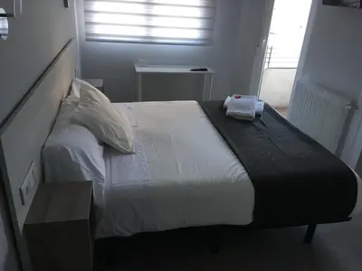 Cama o camas de una habitación en Hostal I Dream Salamanca