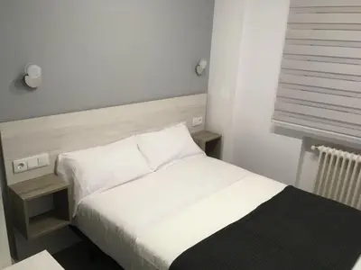 Cama o camas de una habitación en Hostal I Dream Salamanca