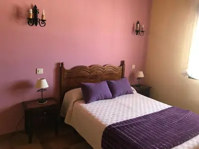 Cama o camas de una habitación en Casa Rural Los Abuelos