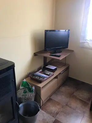 Una televisión o centro de entretenimiento en Casa Rural Los Abuelos