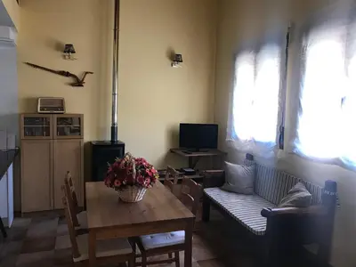 Una televisión o centro de entretenimiento en Casa Rural Los Abuelos