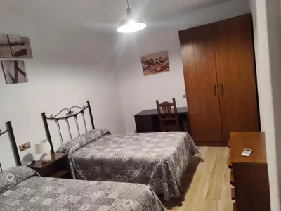 Cama o camas de una habitación en El Hogar de Ardwina