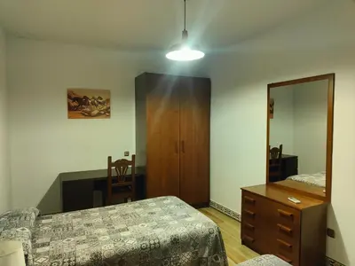 Cama o camas de una habitación en El Hogar de Ardwina