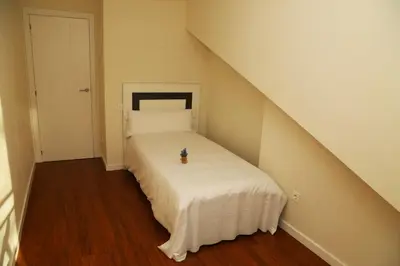 Cama o camas de una habitación en Apartamentos Turísticos Puente Romano P2 2-A