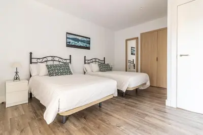 Cama o camas de una habitación en Apartamentos con vistas en el casco histórico - El Patio