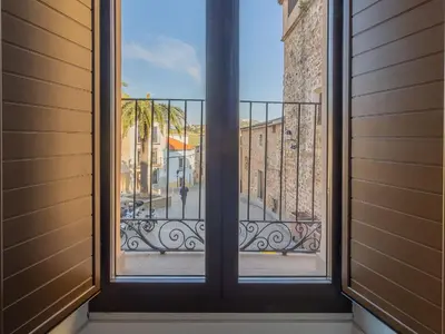 Un balcón o terraza de Apartamentos con vistas en el casco histórico - El Patio