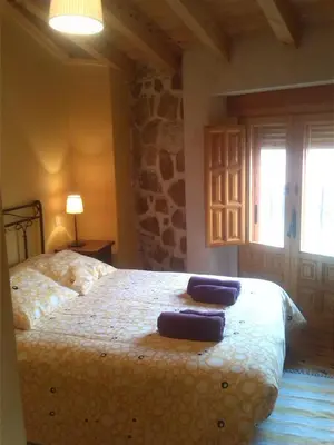 Cama o camas de una habitación en La plaza