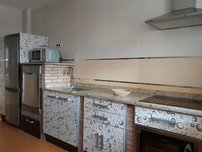 Una cocina o zona de cocina en Casa El lince de Granadilla AT-CC-00296, Norte provincia Cáceres, WIFI, Parque infantil, HIDROMASAJE, garaje, LAVAVAJILLAS