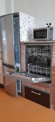 Una cocina o zona de cocina en Casa El lince de Granadilla AT-CC-00296, Norte provincia Cáceres, WIFI, Parque infantil, HIDROMASAJE, garaje, LAVAVAJILLAS