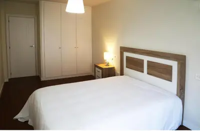 Cama o camas de una habitación en Apartamento Turistico Puente Romano P4 bajo C
