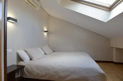 Cama o camas de una habitación en Hostal Concejo