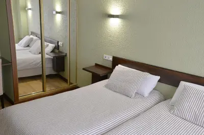 Cama o camas de una habitación en Hostal Concejo