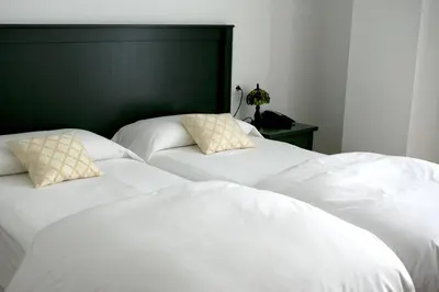 Cama o camas de una habitación en Hotel Rural Salvatierra