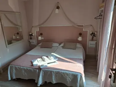 Cama o camas de una habitación en Emperador Augusto