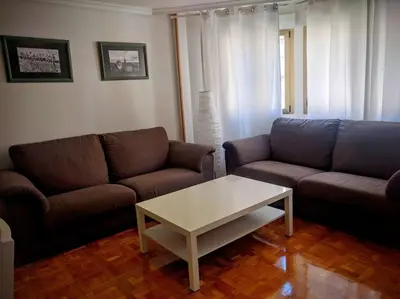 Zona de estar de A pocos minutos del centro con PARKING GRATIS en el edificio Nº REGISTRO Vu-74