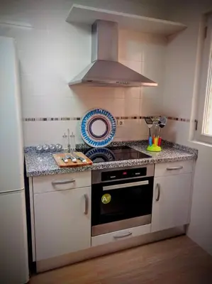 Una cocina o zona de cocina en A pocos minutos del centro con PARKING GRATIS en el edificio Nº REGISTRO Vu-74