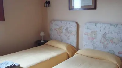 Cama o camas de una habitación en Casa rural Entreaguas