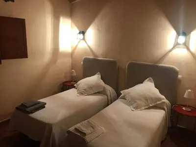 Cama o camas de una habitación en Casa rural Entreaguas