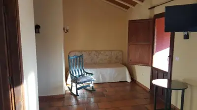 Cama o camas de una habitación en Casa rural Entreaguas