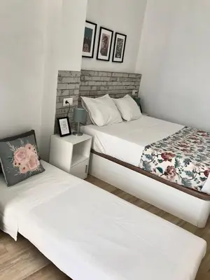 Cama o camas de una habitación en Apartamentos Élite - Art Collection - Frida