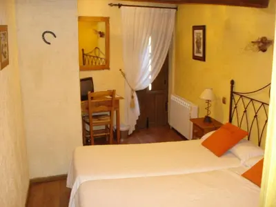 Cama o camas de una habitación en El Balcón de Mogarraz