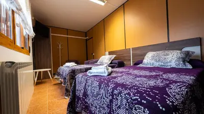 Cama o camas de una habitación en San Jorge, Parking Privado Gratis