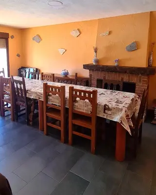 Un restaurante o sitio para comer en Casa la hijita