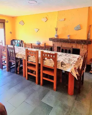 Un restaurante o sitio para comer en Casa la hijita