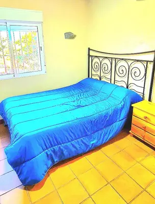 Cama o camas de una habitación en Casa la hijita