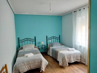 Cama o camas de una habitación en Casa de pueblo