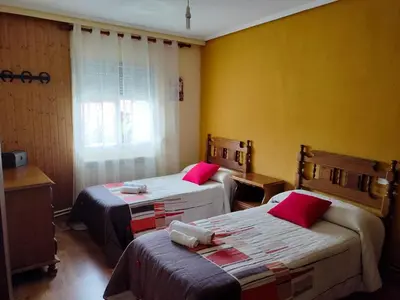 Cama o camas de una habitación en Casa de pueblo