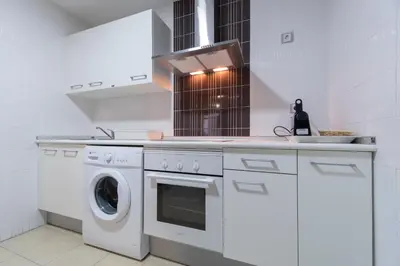 Una cocina o zona de cocina en Apartamentos El Retiro de Avellaneda by RetiroRural