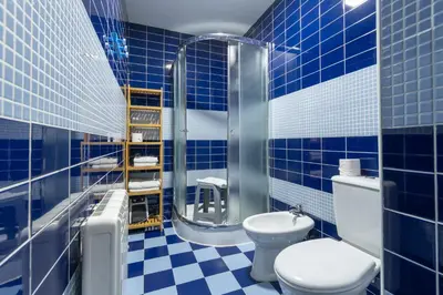 Un baño de Apartamentos El Retiro de Avellaneda by RetiroRural
