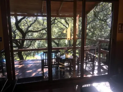 Un balcón o terraza de Cabaña El Valle
