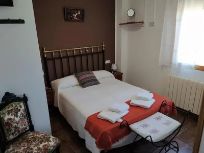 Cama o camas de una habitación en Casa Rural Mi Descanso