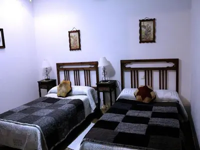 Cama o camas de una habitación en Casa Rural del Puerto de San Vicente